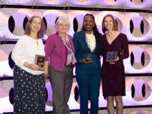 From left: Anne Abbott, Zeljana Javorek (NCFL staff) Dr. Shalun Matthews, and Paige Reuber pose with their awards