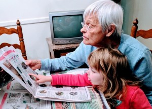 Grandparent and child reading